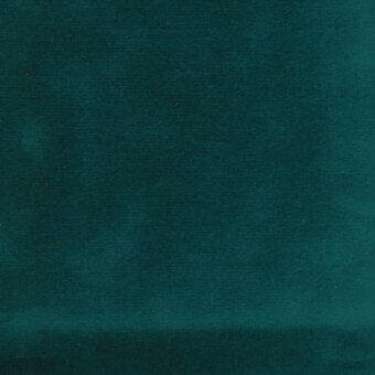 Teal velvet fabric swatch displaying a dense pile and directional sheen, with a horizontal crease and partial label reading “turri 726 n.”